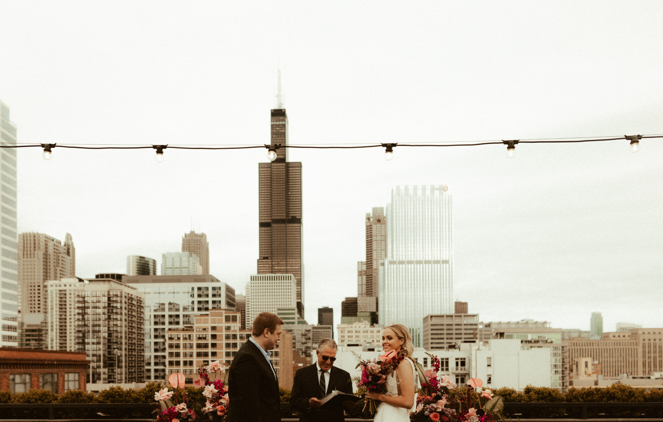 bride and groom eloping on chicago penthouse rooftop