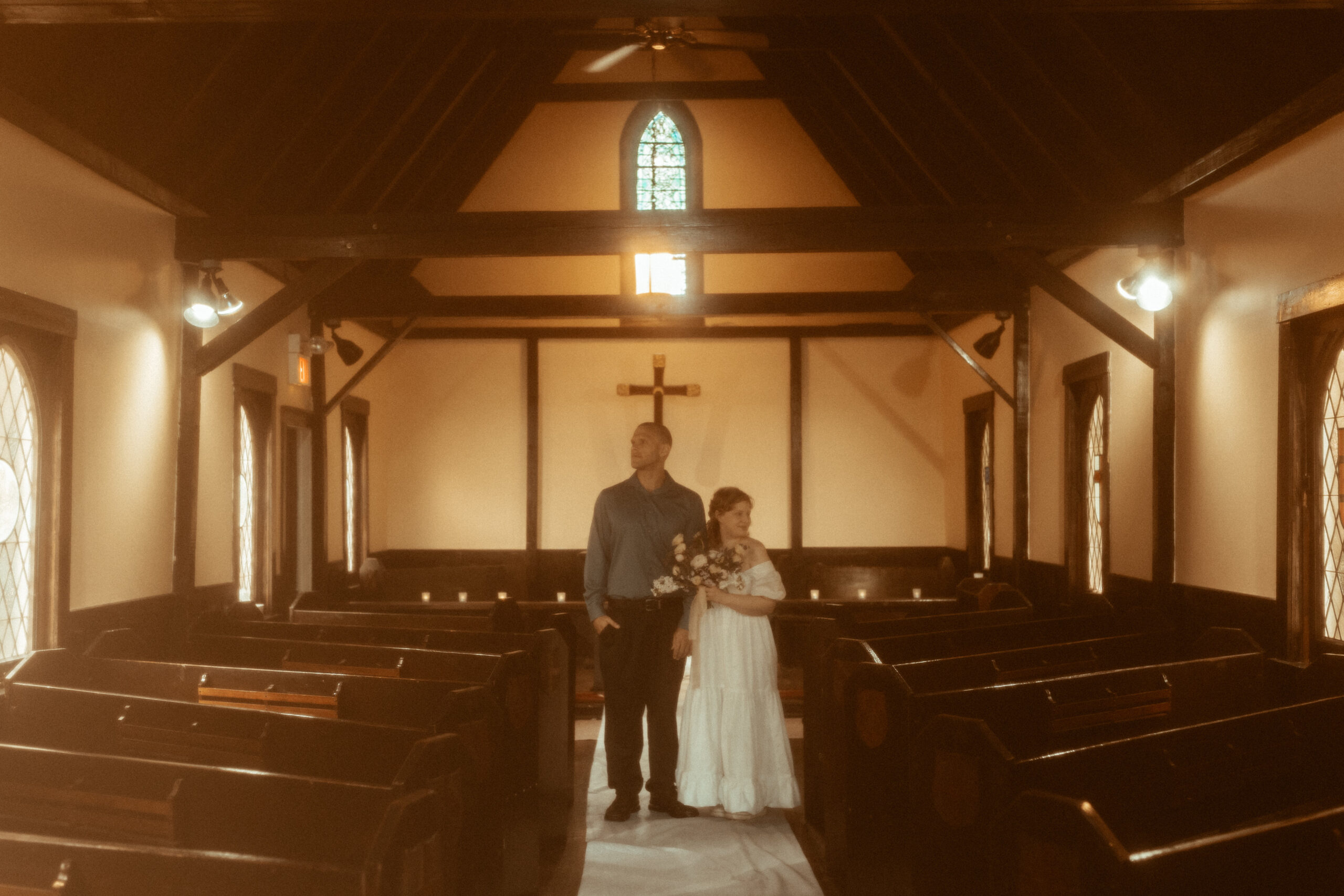 bride and groom standing in wedding chapel for cincinnati elopement