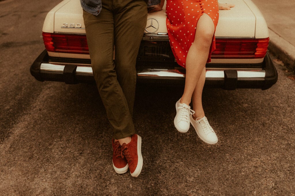 hunter green engagement photo outfit and red retro polka dot dress